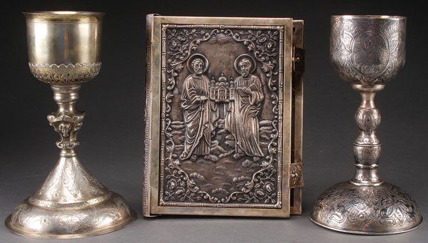 A PAIR OF CHALICES, PROBABLY 19TH CENTURY. One Or: A PAIR OF CHALICES, PROBABLY 19TH CENTURY. One Orthodox, one Latin. The cup of one engraved with the Diesis and bearing 84 silver standard for Moscow, possibly spurious. The other less ornate and appa
