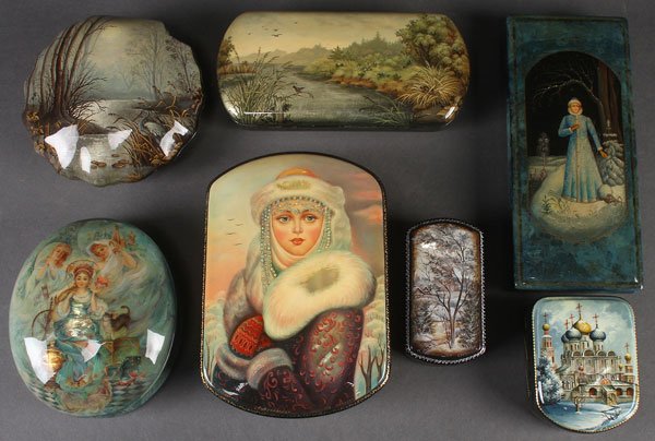 A GROUP OF SEVEN INTERESTING HAND PAINTED RUSSIAN: A GROUP OF SEVEN INTERESTING HAND PAINTED RUSSIAN LACQUER BOXES, CIRCA 2000. Some of unique shape or form. Each artist signed and including the villages of Fedoskino and Kholui. The largest 7 inches x