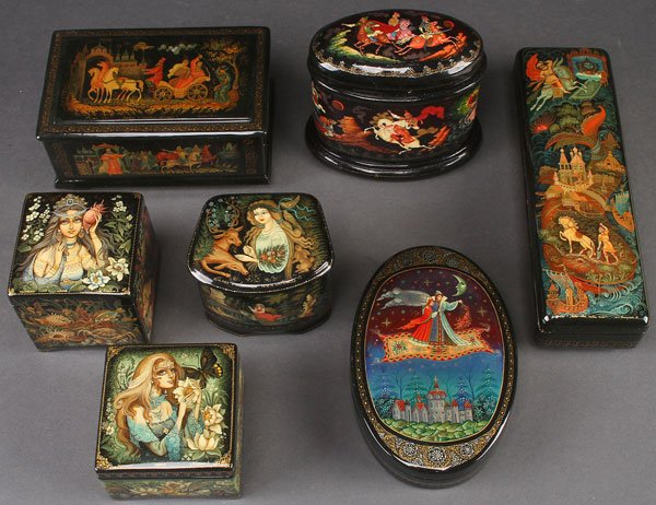 A GROUP OF SEVEN RUSSIAN HAND PAINTED LACQUER BOX: A GROUP OF SEVEN RUSSIAN HAND PAINTED LACQUER BOXES, CIRCA 2000. Each artist signed, including examples from Kholui and Palekh. 8 inches x 2.3 inches x 1.6 inches (20.3 x 6 x 4 cm).