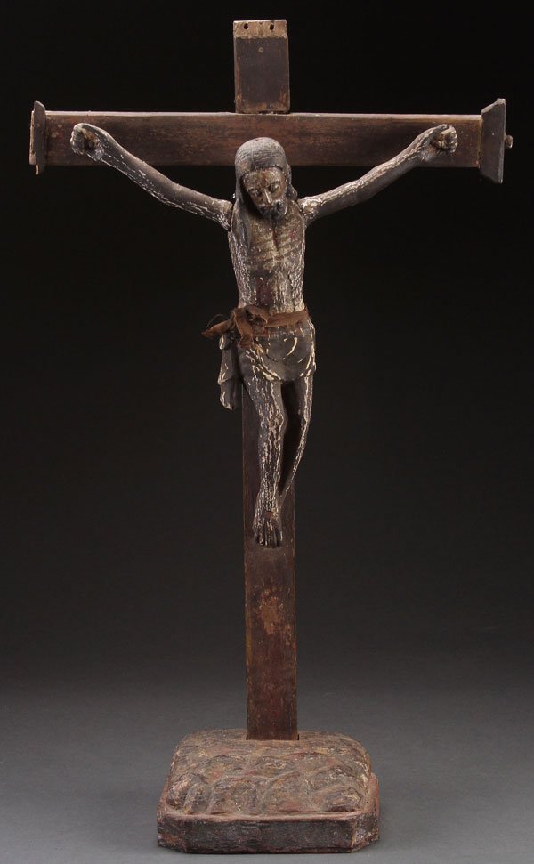 A SPANISH COLONIAL CARVED AND POLYCHROME ALTAR CR: A SPANISH COLONIAL CARVED AND POLYCHROME ALTAR CRUCIFIX, 19TH CENTURY. Overall height 30.5 inches (77.5 cm). Provenance: The Estate of Dr. Edward P. Gerber (1928-2013), Reno, NV.