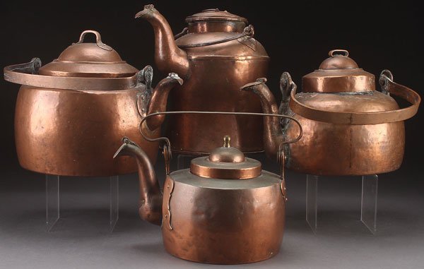 4 LARGE COPPER KETTLES, 19TH CENTURY: A GROUP OF FOUR LARGE COPPER KETTLES, 19TH CENTURY. Three with copper swing handles and one with wrought iron bail handle. Largest height 13.5 inches (34.25 cm).