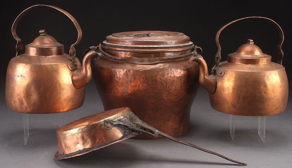 A GROUP OF 19TH CENTURY COPPER COOKWARE: A GROUP OF 19TH CENTURY COPPER COOKWARE. Comprising two tea kettles, a covered pail, and sauce pan with wrought iron handle. Largest height 10 inches (25.5 cm).