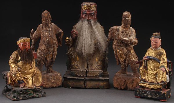 FIVE CHINESE CARVED AND POLYCHROME WOOD FIGURES: A GROUP OF FIVE CHINESE CARVED AND POLYCHROME WOOD FIGURES, 19TH/20TH CENTURY. Various forms and condition, two with attached hair beards. Largest height 10.5 inches (26.5 cm).