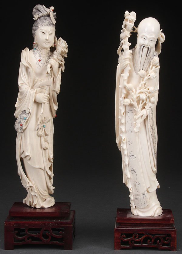 2 CHINESE CARVED IVORY IMMORTALS, PROBABLY LATE 19TH C: A PAIR OF CHINESE CARVED IVORY IMMORTALS, PROBABLY LATE QING DYNASTY. Depicting Kwanyin with lotus branch, accented with turquoise and coral jewels; together with a Buddhist figure with dragon headed 