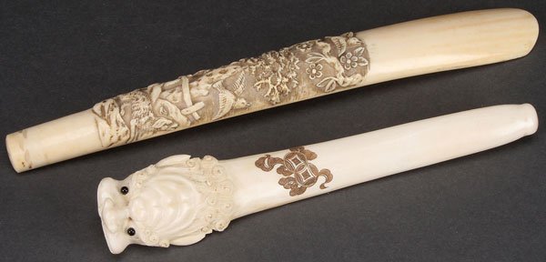 TWO PIECE GROUP OF CHINESE EXPORT CARVED IVORY: TWO PIECE GROUP OF CHINESE EXPORT CARVED IVORY, PROBABLY LATE QING DYNASTY. Comprising a scenic carved umbrella handle and a dragon head carved pipe with incised Buddhist symbols. Largest length 9.5 i