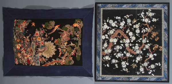 A LARGE CHINESE EMBROIDERED SILK PANEL: A LARGE CHINESE EMBROIDERED SILK PANEL, LATE 19TH/EARLY 20TH CENTURY. Depicting flowering prunus and birds on a black silk embroidered ground and embroidered border with Buddhist symbols. Together wit