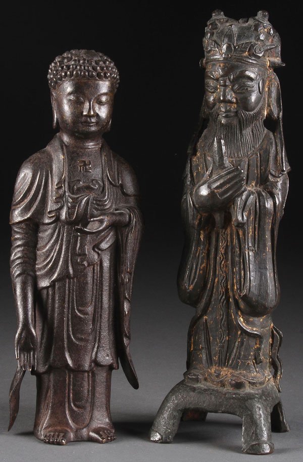 A PAIR IF CHINESE BRONZE BUDDHIST FIGURES, 19TH CENTURY: A PAIR IF CHINESE BRONZE BUDDHIST FIGURES, 19TH CENTURY AND PERHAPS EARLIER, Comprising a standing figure of Buddha and a standing figure of Quan Ti the latter with remnants of gilt. The largest 12.5 