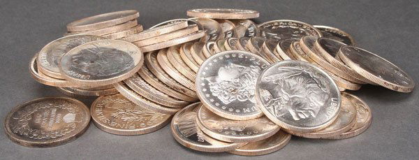 A GROUP OF 50 ONE OUNCE SILVER ROUNDS. With mixed: A GROUP OF 50 ONE OUNCE SILVER ROUNDS. With mixed designs after U.S. coins including Buffalo nickel, Morgan dollar, and Mercury dime. 50 Troy oz. total. Provenance:From a prominent Midwest estate and