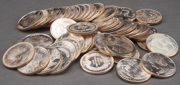 50 1 OZ. SILVER ROUNDS. Mixed designs after U.S.: 50 1 OZ. SILVER ROUNDS. Mixed designs after U.S. coins, including Indian head cent, Buffalo nickel, Morgan and Peace dollars. Provenance:From a prominent Midwest estate and being sold with no reserve.