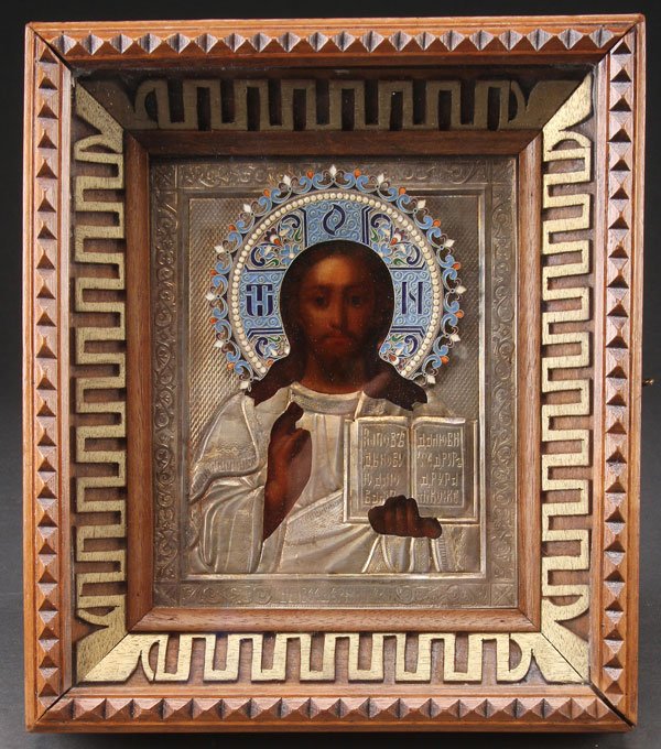A RUSSIAN ICON OF CHRIST: A RUSSIAN ICON OF CHRIST AS THE LORD ALMIGHTY, MOSCOW, 1892. Overlaid with a machine engraved silver-gilt riza hallmarked Moscow, dated 1892, with Cyrillic maker's mark Ye.K, 84 silver standard and wi