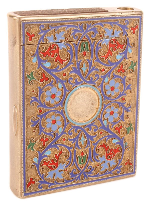A RUSSIAN SILVER GILT AND ENAMEL CIGARETTE CASE: A RUSSIAN SILVER GILT AND CLOISONNÉ ENAMEL CIGARETTE CASE, GRACHEV, CIRCA 1890. The hinged lid and verso similarly enameled with scrolling medallion design on a stippled gilt ground. The spine with