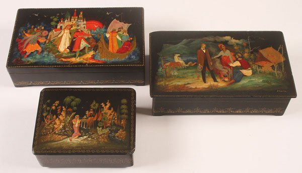 GROUP OF 3 PALEKH SOVIET PERIOD LACQUER BOXES: A GROUP OF THREE PALEKH SOVIET PERIOD LACQUER BOXES. The largest with hinged lid depicting a young man courting a daughter in a countryside with horses in the background, artist signed V. Rozhkov, Pal