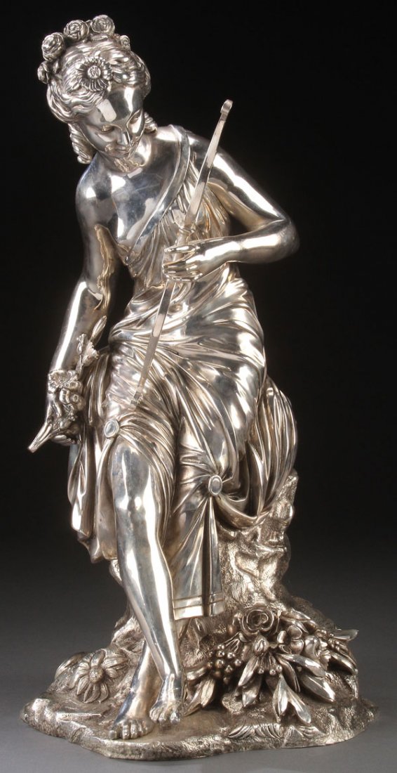 FRENCH SILVERED BRONZE OF VENUS: A FRENCH BRONZE AND SILVERED FIGURE OF VENUS HOLDING CUPID'S BOW, 19TH CENTURY. Finely sculpted in full round with good anatomy and proportions, deep folds and detailing throughout. Apparently unmarke