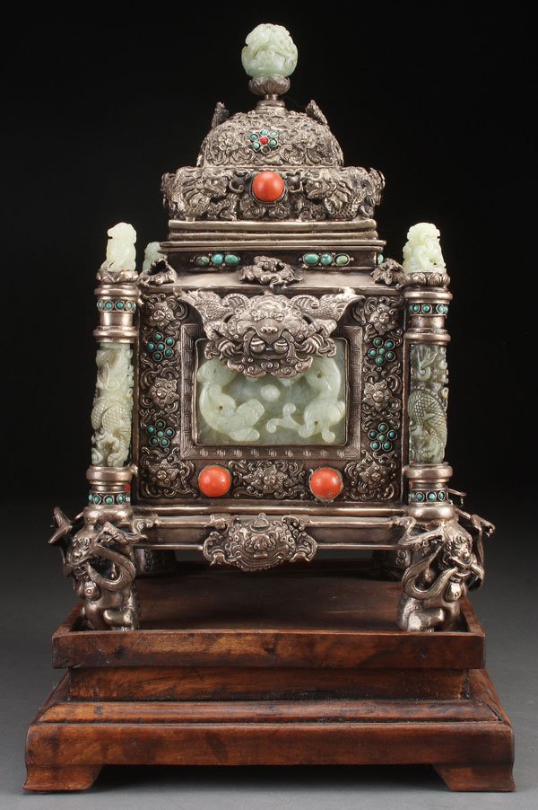 CHINESE MONGOLIAN SILVERED COPPER & JADE SEAL BOX: A LARGE CHINESE MONGOLIAN SILVERED COPPER AND HARDSTONE MOUNTED SEAL BOX, 20TH CENTURY. Of squared form, the four panels repousséd and tooled with Buddhist symbols, two with inset carved rectangular 