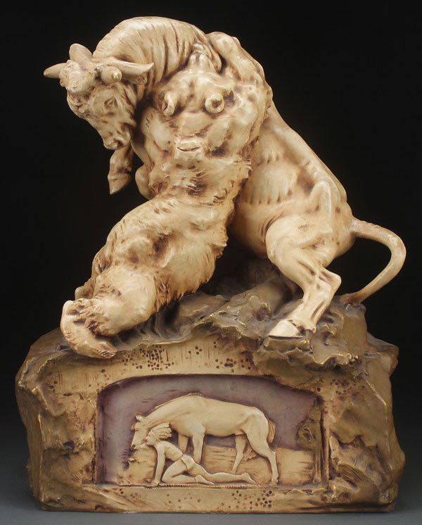 LARGE AUSTRIAN AMPHORA ART POTTERY FIGURAL GROUP: A LARGE AUSTRIAN AMPHORA ART POTTERY FIGURAL GROUP, EARLY 20TH CENTURY. Sculpted in the round in the form of a battling bull and bear surmounting a rockery plinth above a scenic frieze depicting a sta