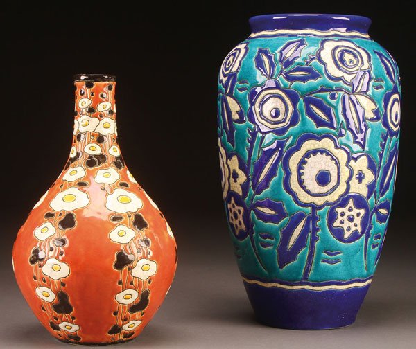 PAIR OF CHARLES CATTEAU FOR BOCH FRERES VASES: A PAIR OF CHARLES CATTEAU FOR BOCH FRERES ART DECO CERAMIC VASES, EARLY 20TH CENTURY. Comprising a stylized floral on amber ground bottle vase, inscribed D.815, CT. with Boch Freres backstamp, height