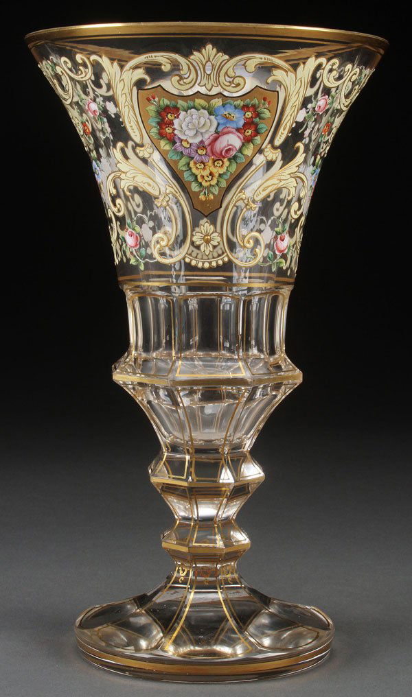 A VERY FINE BOHEMIAN ENAMELED GLASS VASE: A VERY FINE BOHEMIAN ENAMELED GLASS VASE, PROBABLY BY ALEXANDER PFOHL, CIRCA 1900. Of trumpet form in clear crystal with panel cut stem below a flaring rim, finely enameled with ivory scrolls heighten
