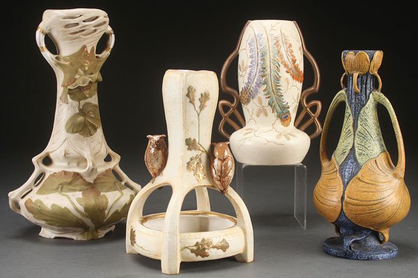 FOUR AUSTRIAN AND BOHEMIAN ART POTTERY VASES, CIR: FOUR AUSTRIAN AND BOHEMIAN ART POTTERY VASES, CIRCA 1900. Including a large Royal Dux stylized floral, a Royal Vienna vase over planter with figural owls, a scissor handled Imperial vase with peacock 