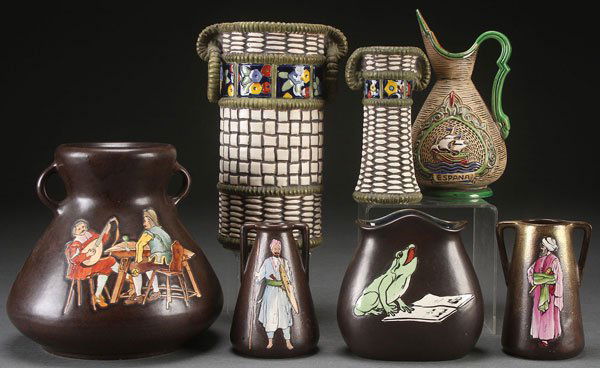 SEVEN PIECE GROUP AUSTRIAN AND CZECH ART POTTERY,: SEVEN PIECE GROUP AUSTRIAN AND CZECH ART POTTERY, EARLY 20TH CENTURY. With four Stellmacher enameled "figures," a pair of Amphora basket weave vases, and a Czech "Espana" handled jug. The largest 9 in