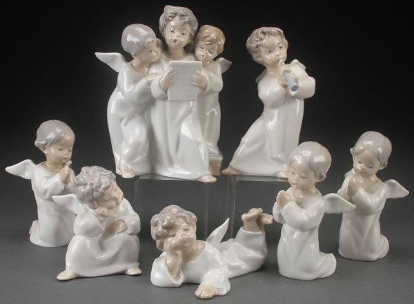 SEVEN LLADRO ANGEL FIGURES: SEVEN LLADRO ANGEL FIGURES. Including a singing angels group. The largest 7 inches.