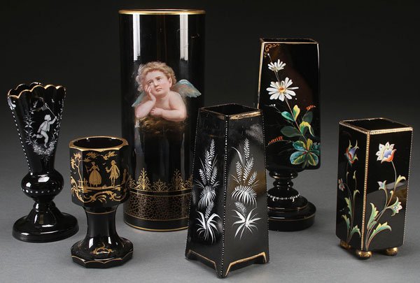 SIX NORTHERN BOHEMIA ENAMELED BLACK HYACINTH VASE: SIX NORTHERN BOHEMIA ENAMELED BLACK HYACINTH VASES, LATE 19TH CENTURY. Probably by Harrach, including a large cylindrical vase, with Raphael like Cherub. The largest 12.7 inches (32.5 cm).