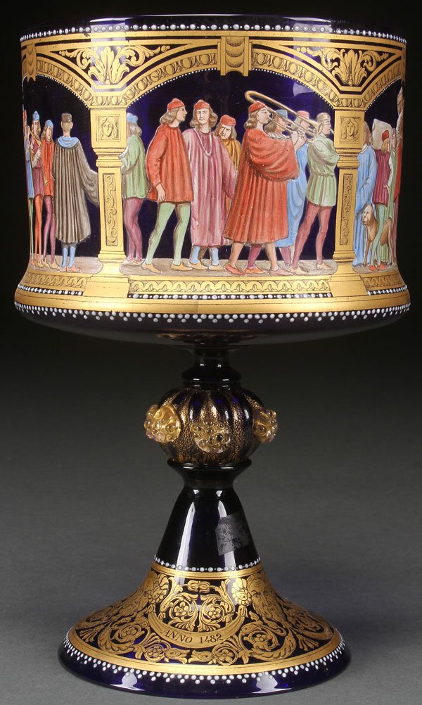 A LARGE VENETIAN ENAMELED AND GILT GLASS RENASSIA: A LARGE VENETIAN ENAMELED AND GILT GLASS RENASSIANCE THEME CHALICE, MID 20TH CENTURY. Depicting in five panels the procession of Doge Mocenigo in 1482. Remnants of retailer's paper labels on base. Hei