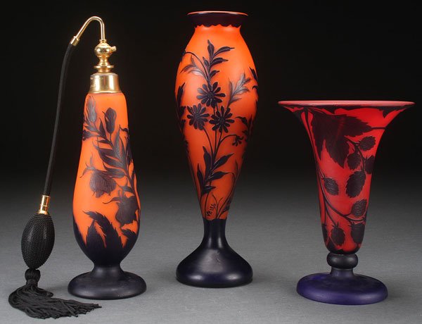 3 LOETZ BOHEMIAN CAMEO GLASS VASES AND PERFUME: THREE LOETZ BOHEMIAN CAMEO GLASS VASES AND PERFUME, EARLY 20TH CENTURY. Comprising an orange with cobalt overlay vase signed "VELES," and a "RICHARD" signed perfume atomizer, and a footed trumpet vase