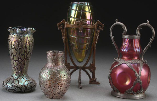A LOETZ AND BOHEMIAN ART GLASS GROUP, CIRCA 1900: A LOETZ AND BOHEMIAN ART GLASS GROUP, CIRCA 1900. Comprising a Loetz cranberry glass and silvered handled mounted vase (see Bohemian Glass v. 1 by Truitt, pg. 89) a teardrop form threaded and iridized
