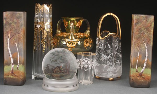 SEVEN PIECE GROUP OF BOHEMIAN ENAMELD ART GLASS: SEVEN PIECE GROUP OF BOHEMIAN ENAMELD ART GLASS, EARLY 20TH CENTURY. Comprising a matching pair of satin glass vases with enameled scenic birch trees, a panel cut and enameled vase possibly by Moser, 
