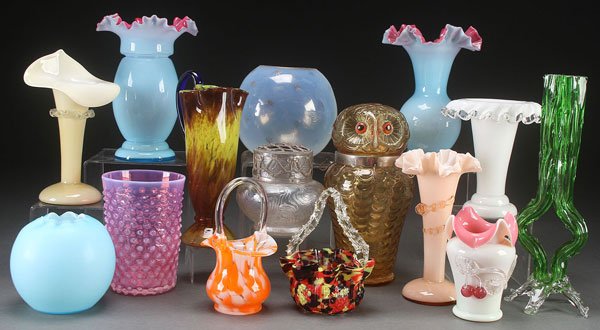 THIRTEEN PIECE GROUP OF CZECH GLASSWARE, 20TH C: THIRTEEN PIECE GROUP OF CZECH GLASSWARE, 20TH CENTURY. Comprising an owl form liquor canister, two cased glass mantel vases, spatter ware baskets, cranberry opalesant hobnail vase, a jack vase, and ot