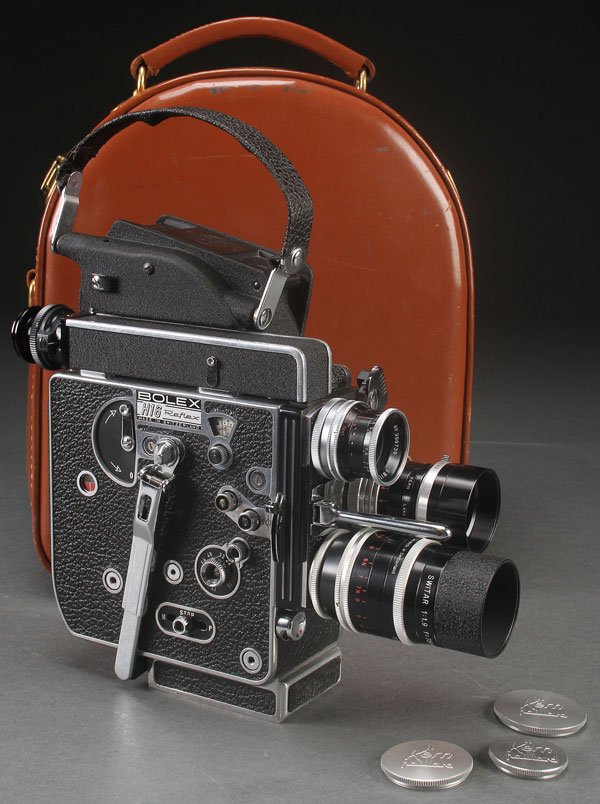 A BOLEX 16mm REFLEX MOTION PICTURE CAMERA: A BOLEX 16mm REFLEX MOTION PICTURE CAMERA, LAST HALF 20TH CENTURY. Comprising a model H16 Reflex, serial #234014. Fitted with three lenses--75mm f1.9 Switar, 26mm f1.1 Switar, 16mm f1.8 Switar lens. C