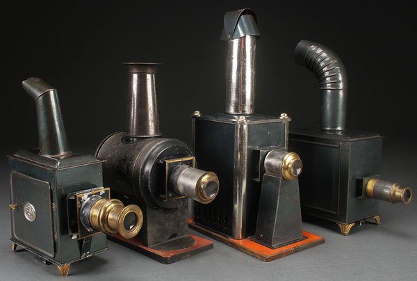 FOUR MAGIC LANTERNS, LATE 19TH EARLY 20TH CENTURY: FOUR MAGIC LANTERNS, LATE 19TH EARLY 20TH CENTURY. Including a Jean Schoenner and Ernst Plank. The largest height 16 inches (40.5 cm).