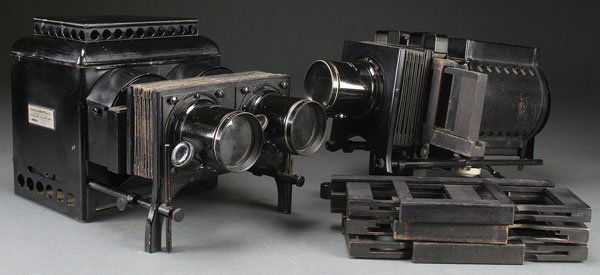 TWO EARLY BAUSCH AND LOMB LANTERN SLIDE PROJECTOR: TWO EARLY BAUSCH AND LOMB LANTERN SLIDE PROJECTORS, EARLY 20TH CENTURY. Including a balopticon with dual lenses for dissolving images, both electric, the longest 16 inches (41 cm).