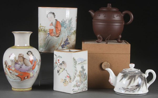 A FOUR PIECE GROUP OF CHINESE FAMILLE ROSE PORCELAIN: A FOUR PIECE GROUP OF CHINESE FAMILLE ROSE PORCELAIN. Comprising a Republic style vase with figures, a brush pot with figure and calligraphy inscription, a squared scenic brush pot, a Republic small c