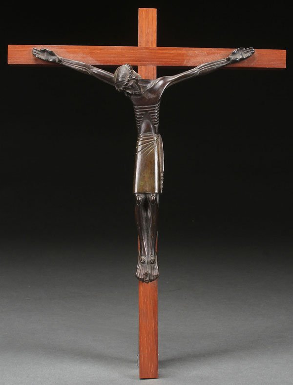 A JEAN LAMBERT-RUCKI (FRENCH 1888-1966) PATINATED: A JEAN LAMBERT-RUCKI (FRENCH 1888-1966) PATINATED BRONZE CORPUS CHRISTI MOUNTED ON ORIGINAL POLISHED WOOD CROSS. On verso label "Adalo. Paris, France." Length of corpus 8.5 inches (21.5 cm). Overall l