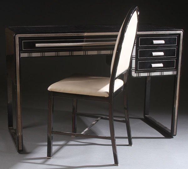 A NORMAN BEL GEDDES FOR SIMMONS PAINTED STEEL ART: A NORMAN BEL GEDDES FOR SIMMONS PAINTED STEEL ART DECO WRITING DESK/VANITY AND CHAIR, CIRCA 1930'S. Length 43 inches (109 cm).