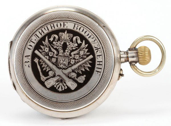 A SWISS MADE PRESENTATION WATCH FOR THE IMPERIAL: A SWISS MADE PRESENTATION WATCH FOR THE IMPERIAL RUSSIAN MILITARY, TISSOT, CIRCA 1900. The silver case nielloed on the front with the Imperial Russian double-headed Eagle with crossed artillery canno