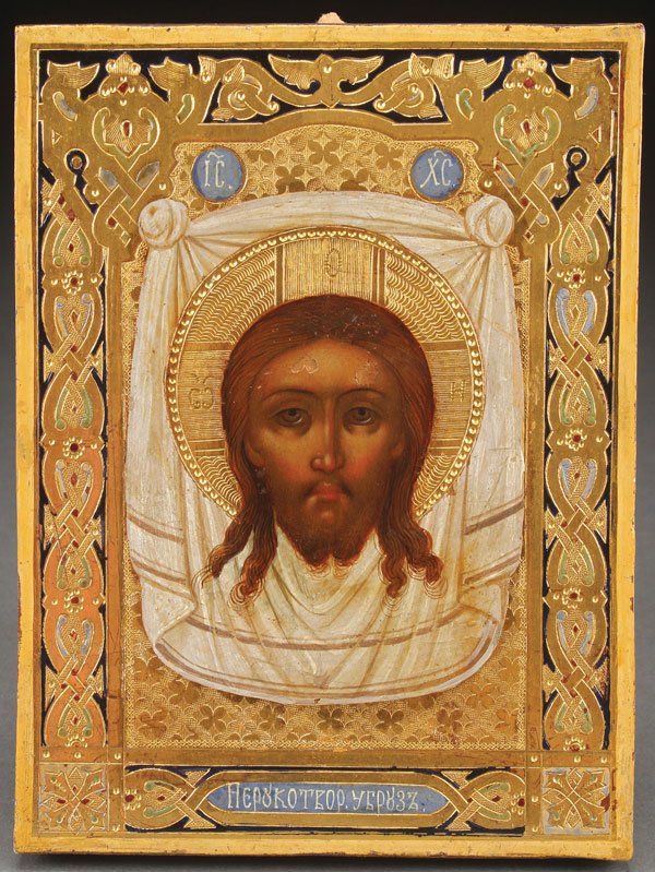 A RUSSIAN ICON OF THE HOLY VISAGE, TRINITY POSAD: A RUSSIAN ICON OF THE HOLY VISAGE, TRINITY POSAD WORKSHOP, CIRCA 1890. Here the face of Christ is shown as it was miraculously transferred onto a cloth. Painted on an ornately incised gilt ground, the