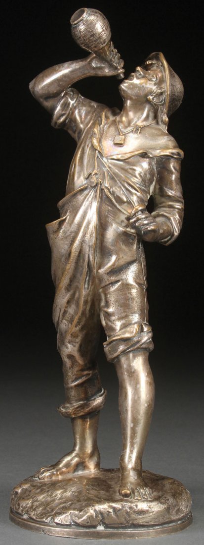 A FRENCH BRONZE FIGURE OF A MAN DRINKING WINE: A FRENCH BRONZE FIGURE OF A MAN DRINKING WINE, 19TH CENTURY. With silver-gilt patina. Inscribed "Lalouette." Height 9.5 inches (24.25 cm).