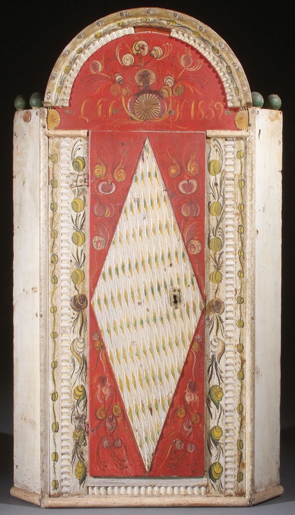 A VERY FINE NORWEGIAN CORNER WALL CABINET: A VERY FINE NORWEGIAN CORNER WALL CABINET WITH ROSEMALING IN THE OS STYLE, DATED 1859. The single panel door carved with a raised diamond form and further carved with vertical and angular flutes, rese