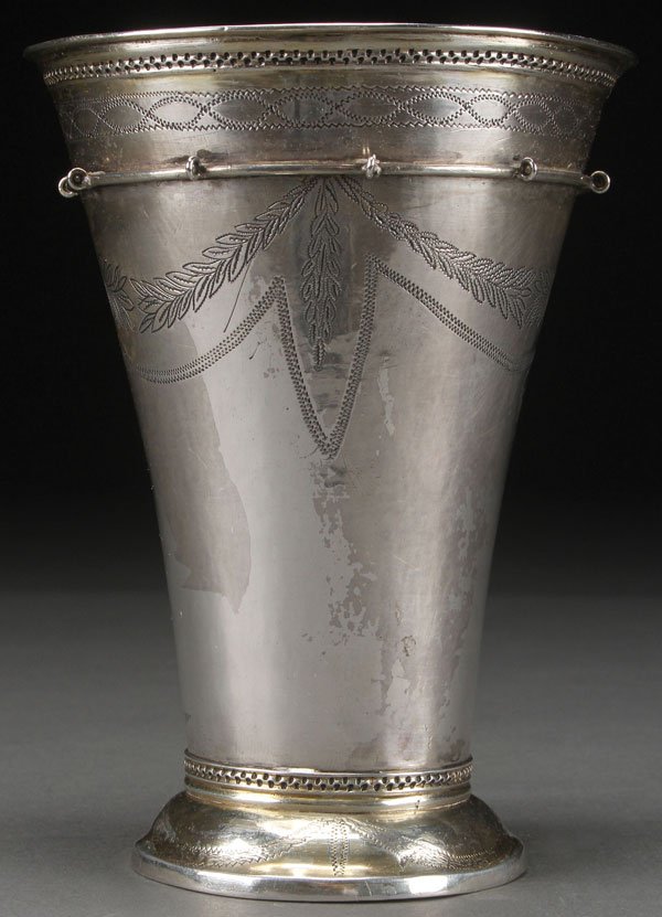18TH CENTURY SWEDISH PARCEL-GILT SILVER BEAKER: A LARGE EARLY 18TH CENTURY SWEDISH PARCEL-GILT SILVER BEAKER, CIRCA 1701. Apparently unmarked, of tapering cylindrical form with a design of pricked and wriggle worked festoons above an applied rail w