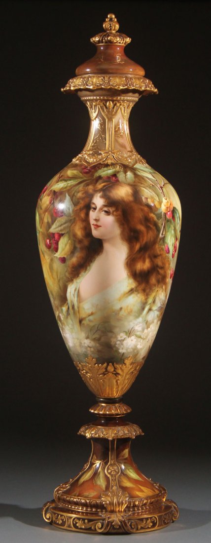 A LARGE SPECTACULAR ROYAL BONN HAND PAINTED: A LARGE SPECTACULAR ROYAL BONN HAND PAINTED EXPOSITION PORTRAIT URN, LATE 19TH CENTURY. Depicting a bust portrait of a beautiful woman surrounded by fruit, artist signed Henseler. Raised on a socket m