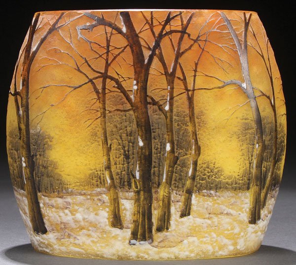 A DAUM NANCY FRENCH CAMEO ENAMELED WINTER SCENE: A DAUM NANCY FRENCH CAMEO ENAMELED WINTER SCENE ART GLASS VASE, EARLY 20TH CENTURY. Of pillow form in gray glass internally decorated with mottled amber and yellow cut glass with a design of leaf bar