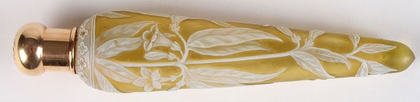 ATTRIBUTED TO WEBB FOR TIFFANY & CO. GOLD MOUNTED: A THOMAS WEBB FOR TIFFANY & CO. GOLD MOUNTED CAMEO GLASS PERFUME, LATE 19TH CENTURY. In citron colored glass overlaid with opal cut with leafy vine and bell-shaped flowers. The monogramed cap stamped