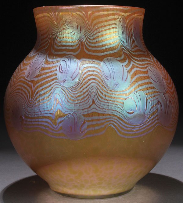 A VERY FINE LOETZ "ARGUS" PHANOMEN IRIDIZED VASE: A VERY FINE LOETZ "ARGUS" PHANOMEN IRIDIZED ART GLASS VASE, CIRCA 1900. Of bulbous form with silvery blue decoration on an iridized gold-mottled ground. Height 6 inches (15 cm).