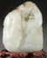 A CHINESE CARVED WHITE JADE BOULDER - 2