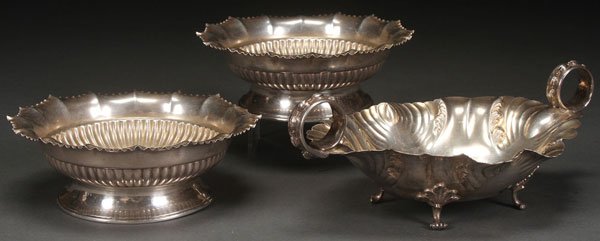 THREE TIFFANY & CO. STERLING DISHES, LATE 19TH: THREE TIFFANY & CO. STERLING DISHES, LATE 19TH, EARLY 20TH CENTURY. Comprising two fluted ribbed and scalloped rim sauce bowls and an ovoid footed bowl cast with bell flower ring handles, each with st