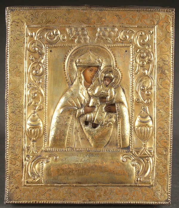 A RUSSIAN ICON OF THE RUDENSKAYA MOTHER OF GOD: A RUSSIAN ICON OF THE RUDENSKAYA MOTHER OF GOD, 18TH AND 19TH CENTURY. A scarce Russian icon of the Rudenskaya Mother of God, circa 1900, with an earlier silver-gilt repoussé and chased riza, hallmar