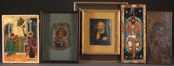 A GROUP OF SIX ICONS, 20TH CENTURY: A GROUP OF SIX ICONS, 20TH CENTURY. Comprising an icon of the Annunciation, a framed fragment depicting a bust portrait, Saint Nicholas contained in a glazed frame, Christ Enthroned, an incised fragme