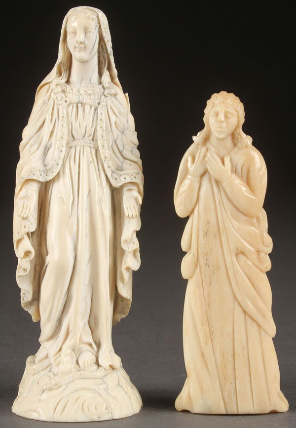 A CARVED IVORY FIGURE OF THE MADONNA: A CARVED IVORY FIGURE OF THE MADONNA, PROBABLY FRENCH, CIRCA 1800. Carved in full round, with deep folds. Height 4.8 inches (12 cm). Together with a carved polished bone figure of a Saint, 18th centur